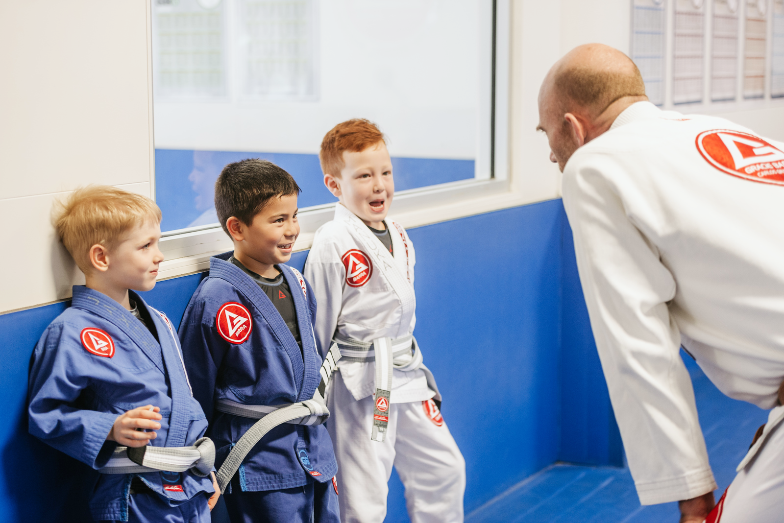 Kids learning Jiu-Jitsu techniques