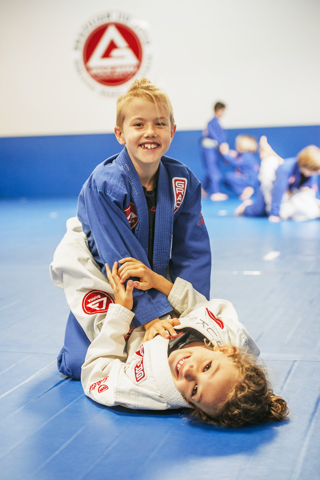 Kids smiling during first BJJ class